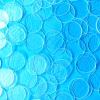 a close up of a blue background with circles