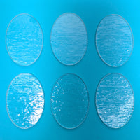 a blue background with four circles of different sizes